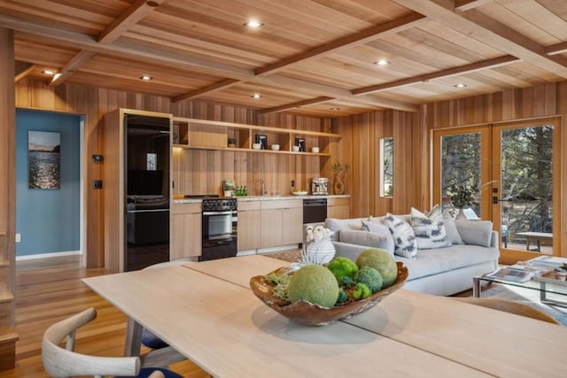 living room featuring light hardwood / wood-style floors, beamed ceiling, coffered ceiling, wood ceiling, and french doors