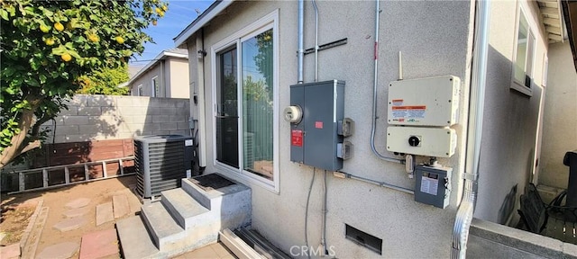 view of property exterior with central air condition unit