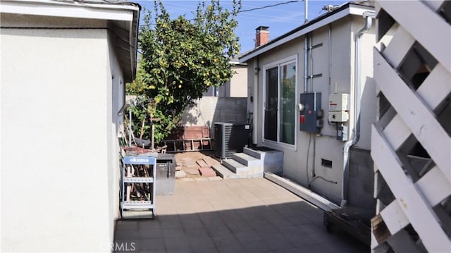 view of patio with central AC