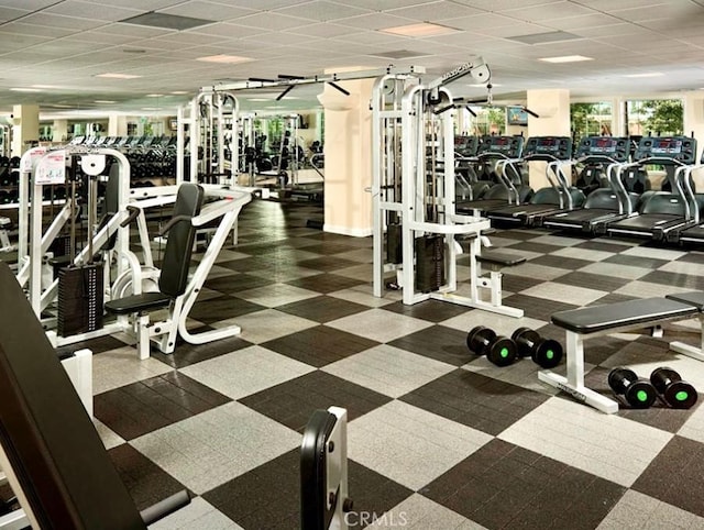 exercise room with a drop ceiling