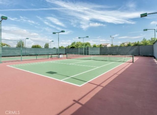 view of tennis court with basketball court