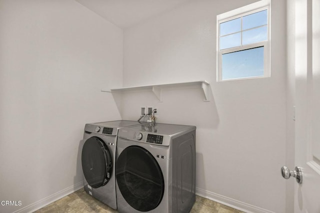 laundry area with washer and dryer