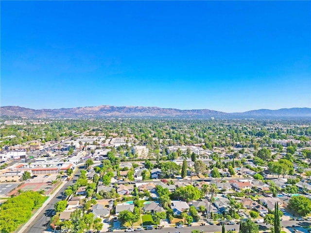 drone / aerial view featuring a mountain view