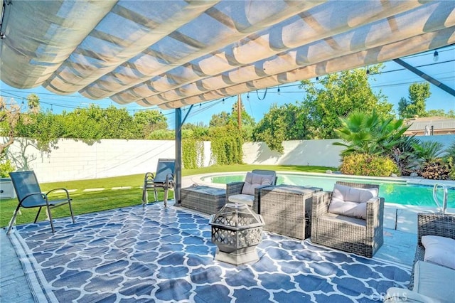 view of patio / terrace featuring a fire pit, a fenced in pool, and a pergola