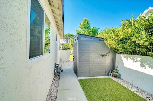 exterior space featuring a shed