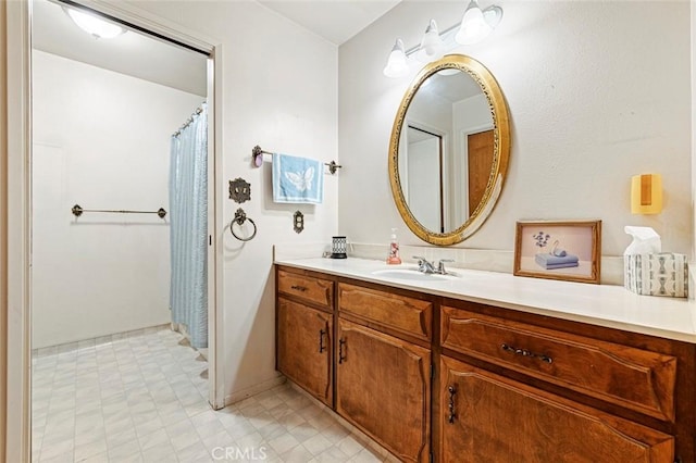 bathroom with vanity and a shower with shower curtain