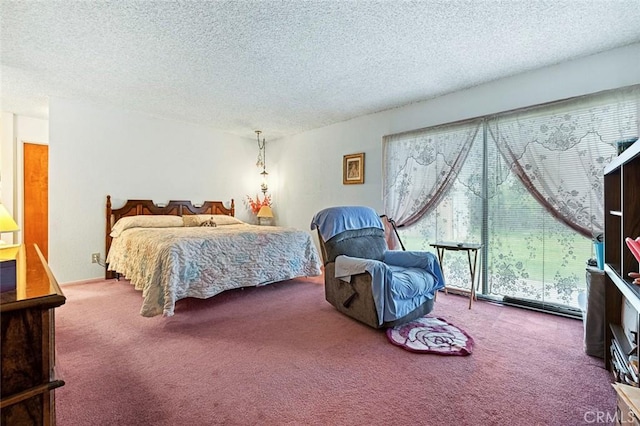 carpeted bedroom with a textured ceiling