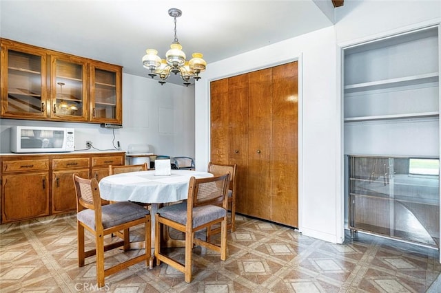 dining area with a chandelier