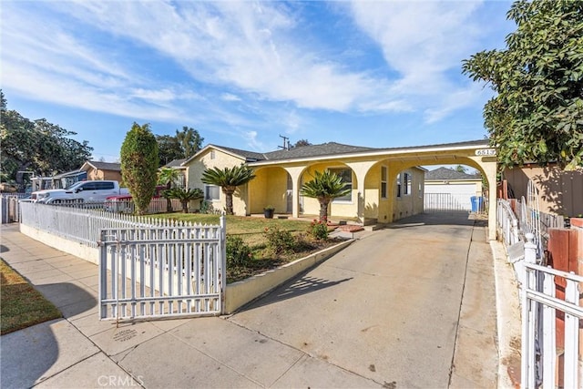 ranch-style home with a carport