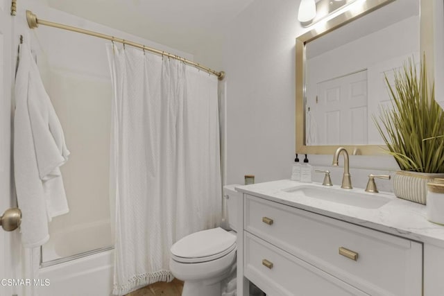 full bathroom with toilet, vanity, and shower / tub combo