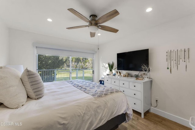 bedroom featuring light wood-type flooring, ceiling fan, and access to outside