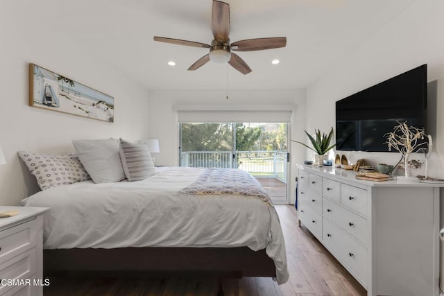 bedroom featuring ceiling fan, light hardwood / wood-style floors, and access to outside