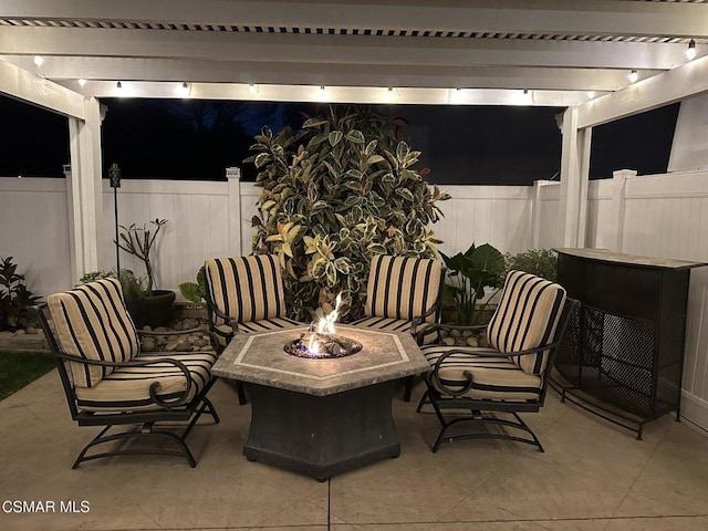 view of patio featuring a pergola and an outdoor fire pit