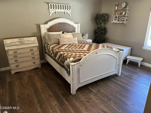 bedroom featuring dark hardwood / wood-style floors