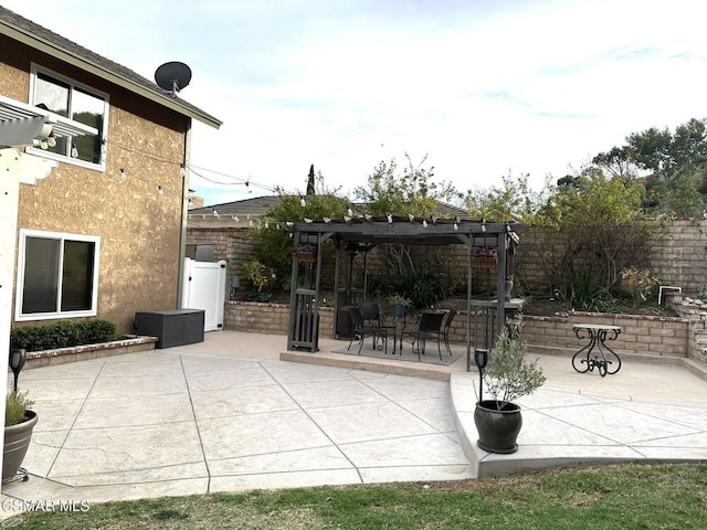 view of patio / terrace featuring a pergola