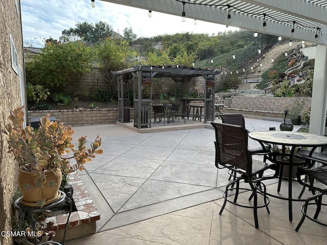 view of patio / terrace with a pergola