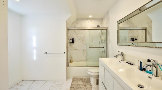 full bathroom featuring toilet, vanity, and combined bath / shower with glass door