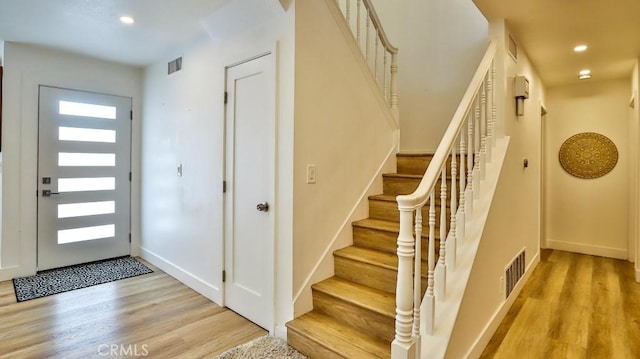 foyer entrance featuring light hardwood / wood-style flooring