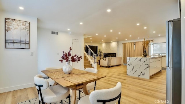 dining room featuring light hardwood / wood-style flooring