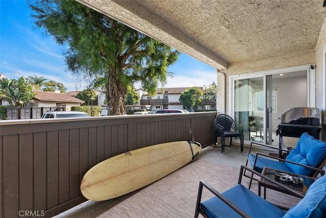 balcony featuring area for grilling