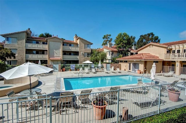 view of swimming pool featuring a patio