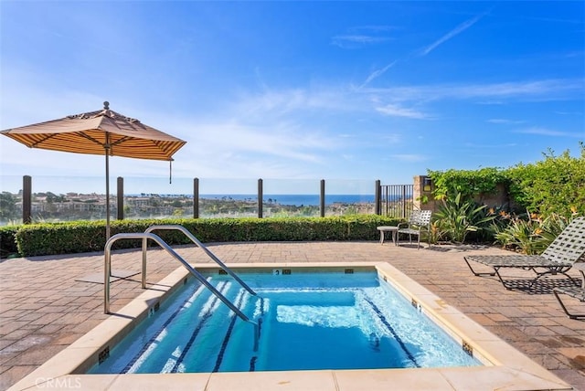 view of pool with a community hot tub