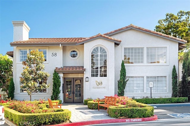 mediterranean / spanish house with french doors