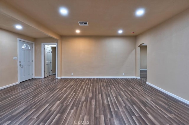 interior space with dark hardwood / wood-style flooring