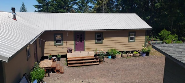 view of front of house with a wooden deck