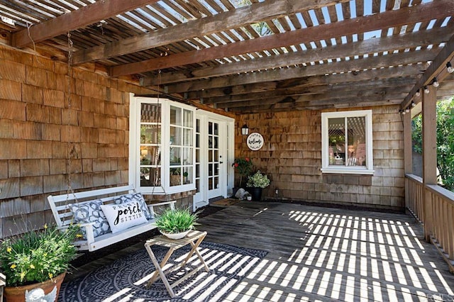 wooden deck with a pergola