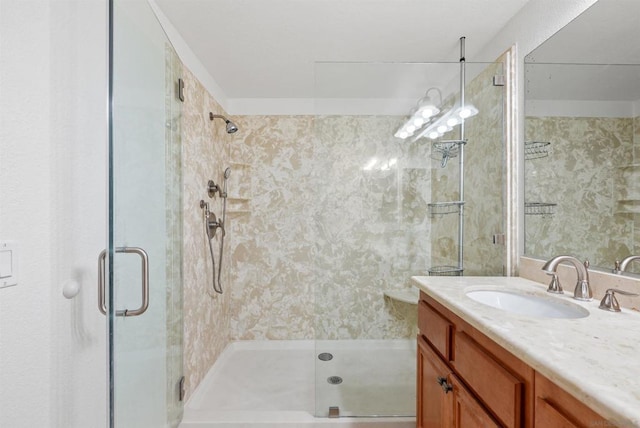 bathroom with vanity and an enclosed shower