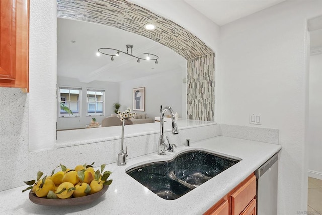 kitchen featuring sink and stainless steel dishwasher