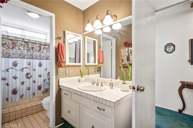 bathroom featuring walk in shower, tile patterned floors, vanity, and toilet