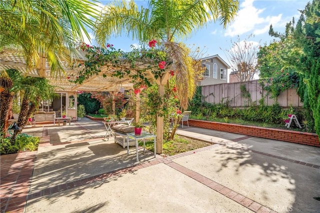 view of patio / terrace featuring a pergola