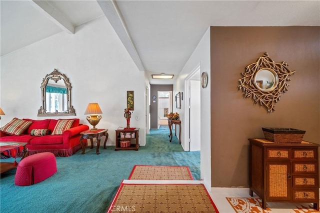 hall with vaulted ceiling with beams and carpet floors