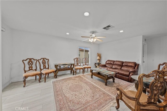 living room with ceiling fan