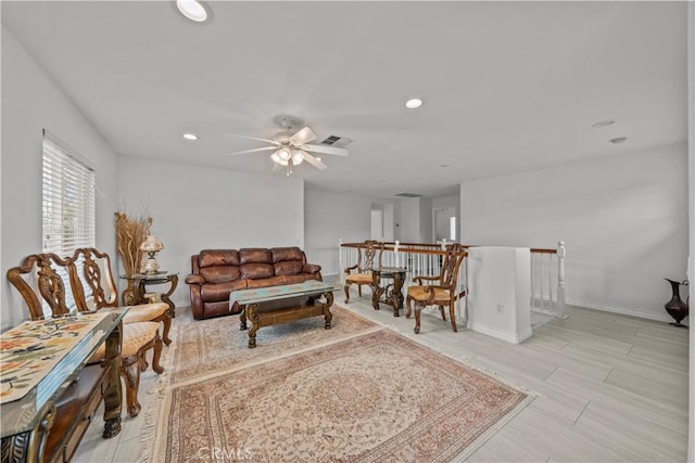 living room featuring ceiling fan