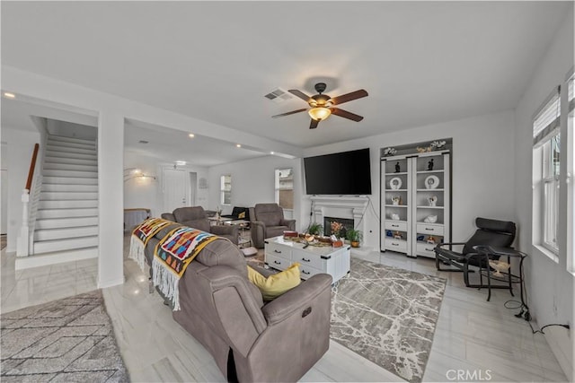 living room with ceiling fan