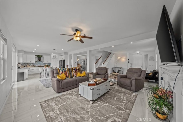 living room featuring ceiling fan