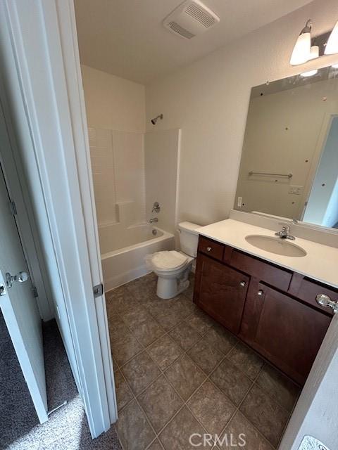 full bathroom with tile patterned floors, vanity, toilet, and shower / bath combination