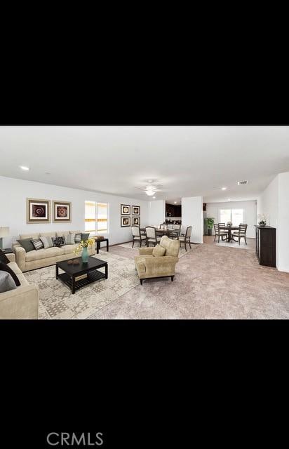 living room featuring carpet floors