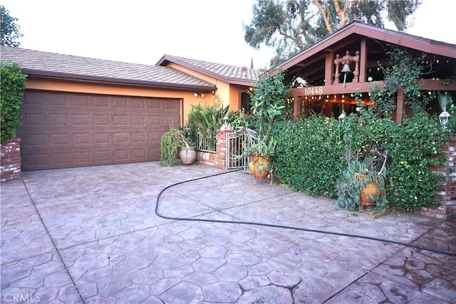 view of front of home featuring a garage