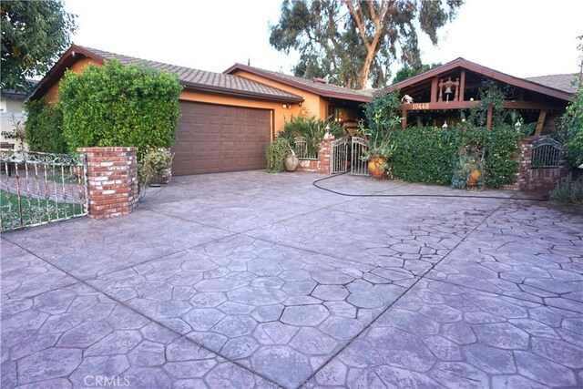 view of front of home featuring a garage