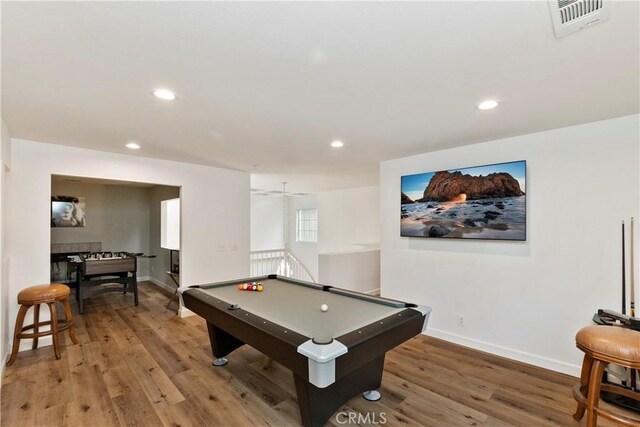 recreation room with hardwood / wood-style flooring, ceiling fan, and billiards