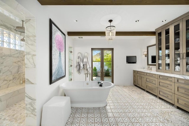 bathroom with beamed ceiling, french doors, vanity, and separate shower and tub