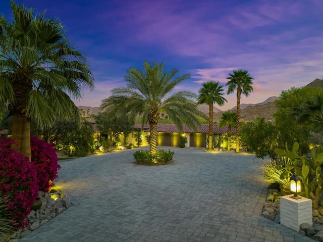 view of front of home with a water and mountain view