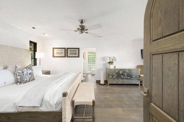 bedroom featuring ceiling fan and hardwood / wood-style flooring