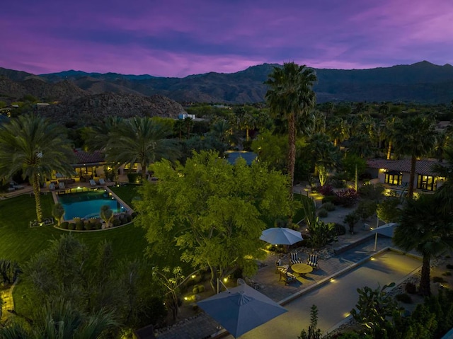 aerial view at dusk with a mountain view