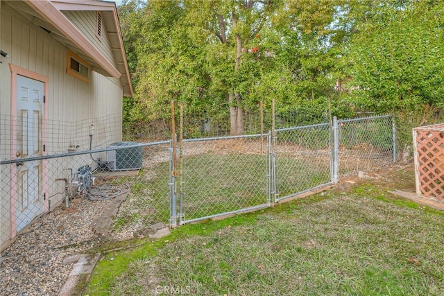 view of yard featuring central AC