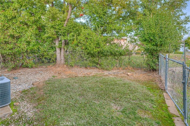 view of yard featuring central AC unit